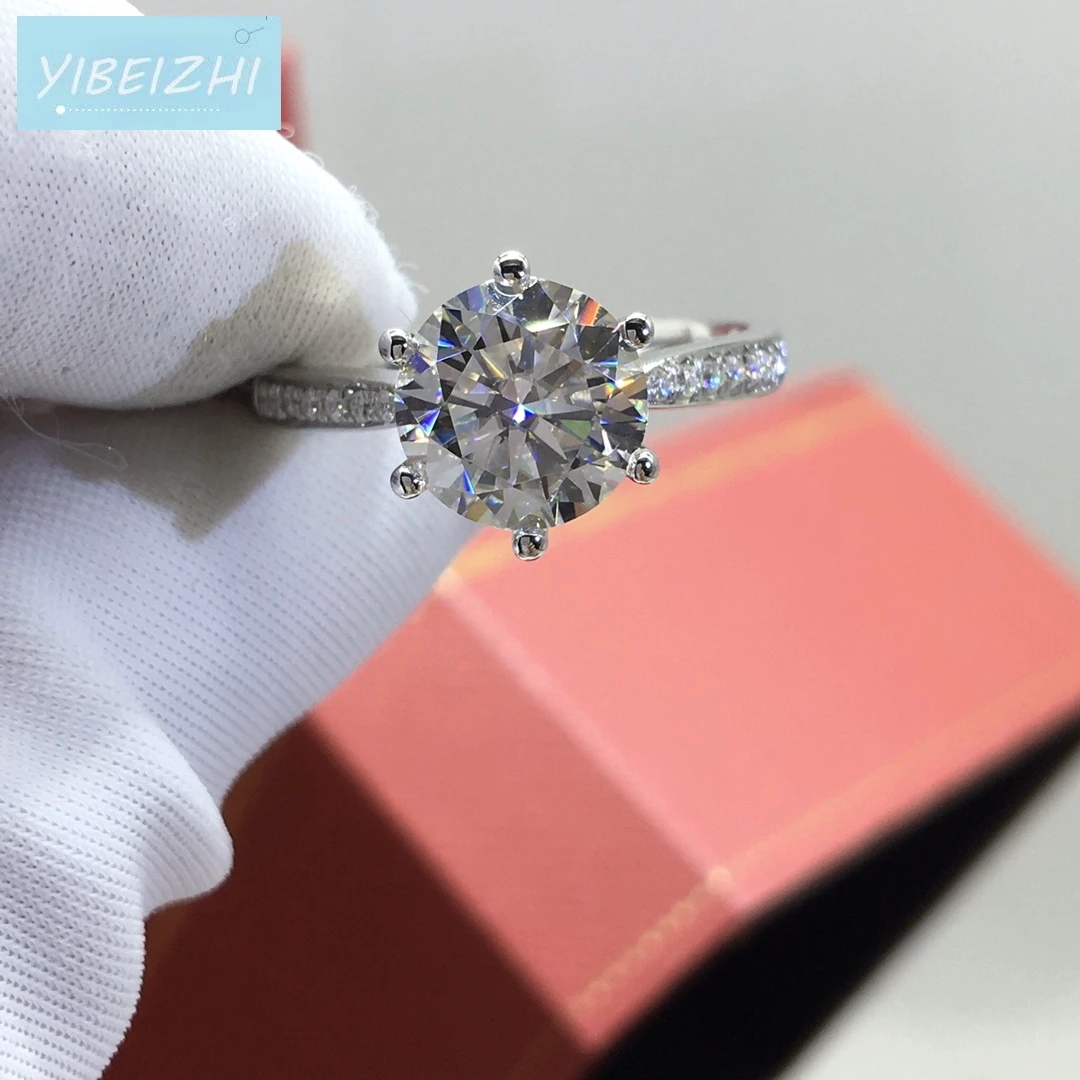 

The New Classic 6 Claws 925 Silver Round Excellent Cut 2ct D Color Pass Diamond Moissanite Test Ring Female Wedding Jewelry