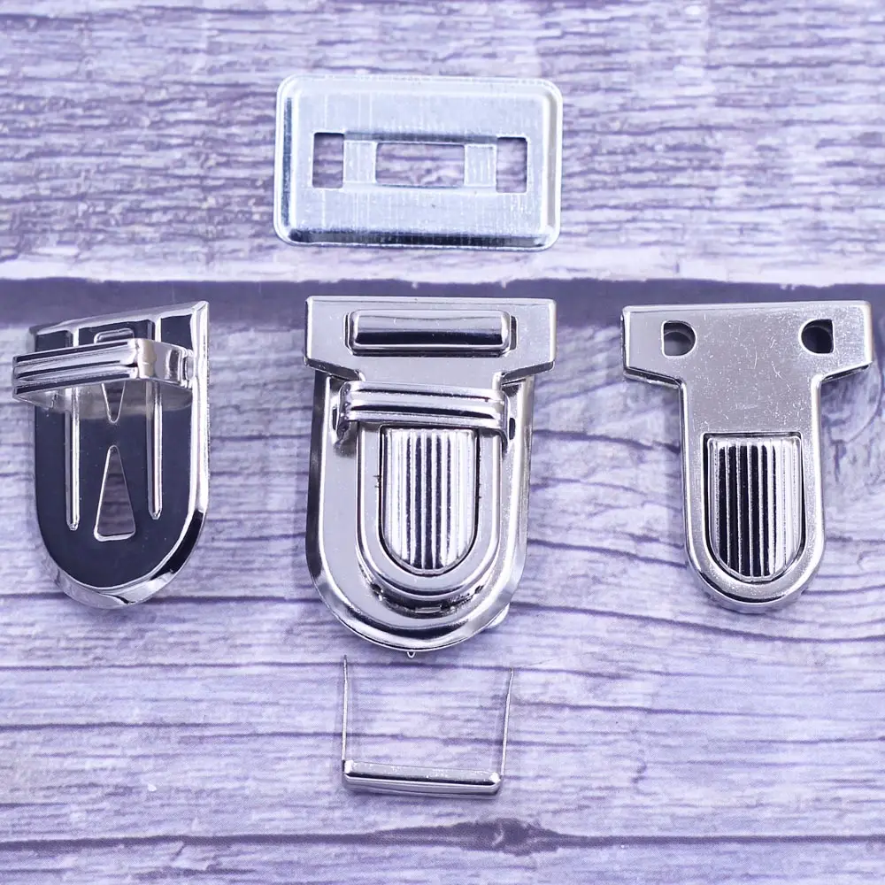 

50Sets Metal Bag Clasp Handbag Press Push Closure Purse Tongue Lock Briefcase Spring Lock Leather Luggage Hardware Parts 34x25mm