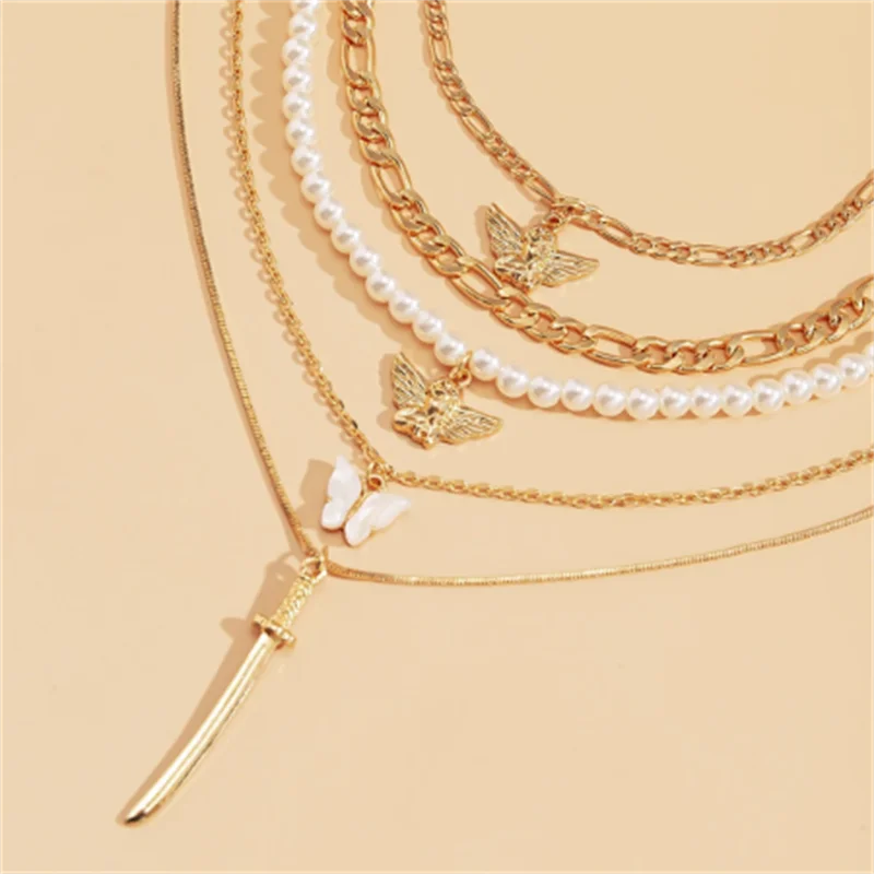 

2021New 5 piece Set Of imitation Pearl Chain Pendant Angel Butterfly Sword Multilayer Necklace Punk Jewelry Party Gift Wholesale