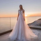 Роскошное прозрачное свадебное платье с глубоким декольте, 2021 аппликация из тюля с блестками и шлейфом, прозрачное пляжное свадебное платье
