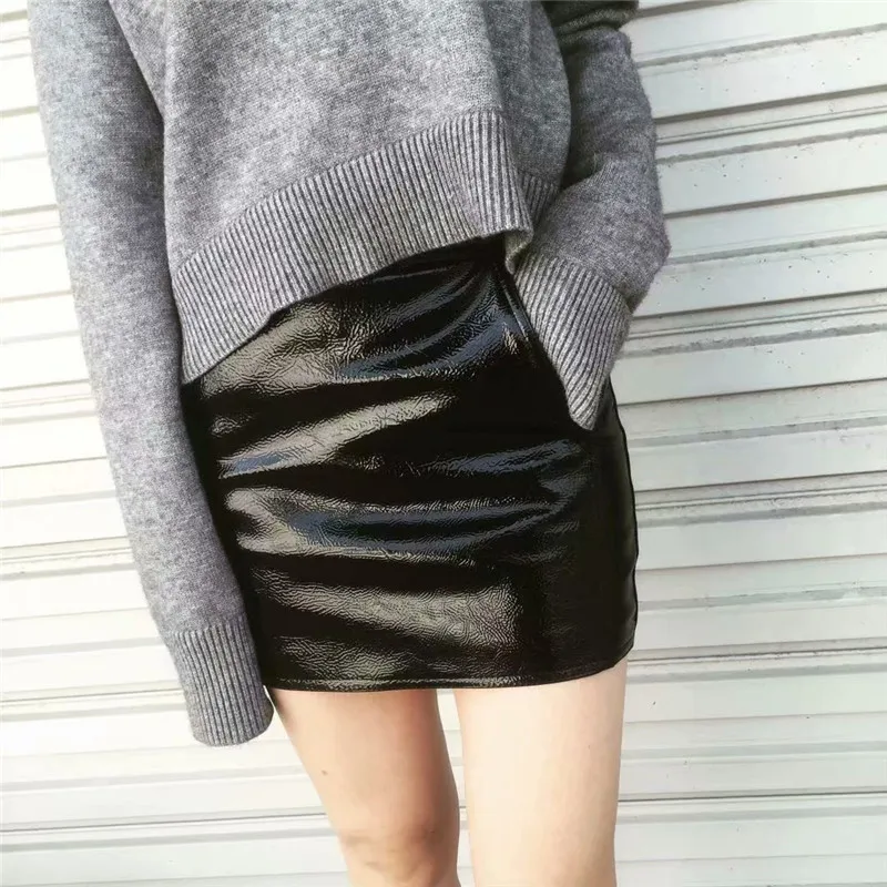 

Autumn and winter new fashion street locomotive PU leather bright bread hip skirt women, solid color sexy bag hip skirt women