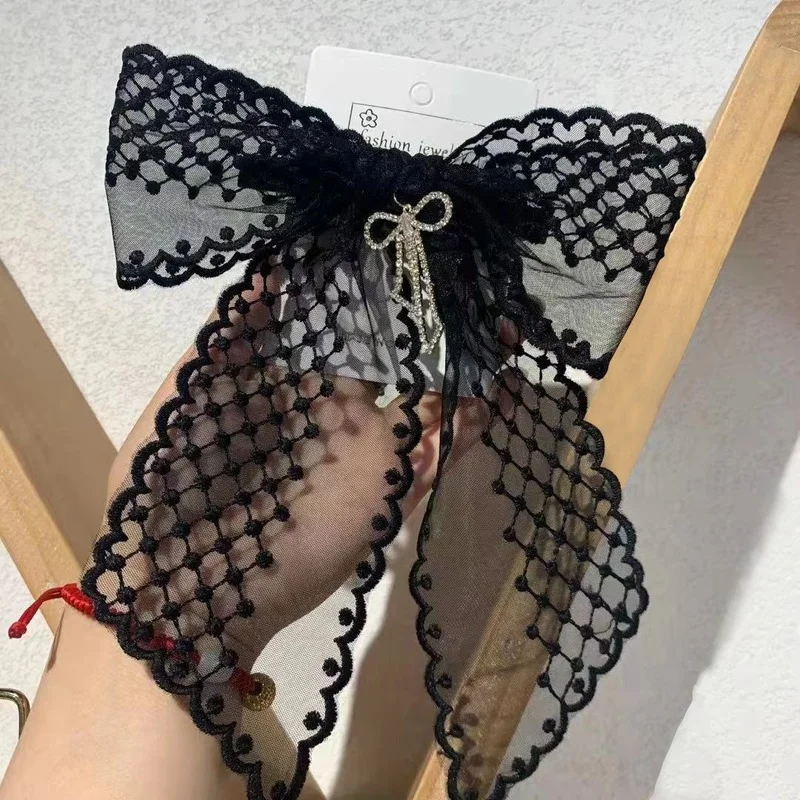 

South Korea ins net red polka dot net yarn lace bow hairpin tassel diamond pendant out holiday ponytail clip