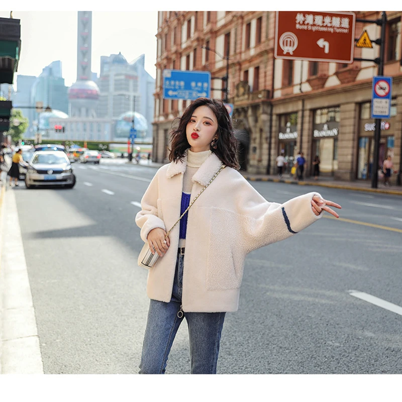 

Autumn and winter fur lambs wool coat young short short 2020 Korean version of the new simple and fashionable elegant coat