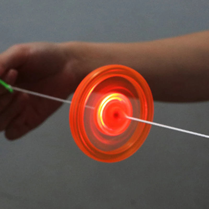 

1pc Flash Pull Line Led Flywheel Hot Fire Wheel Glow Flywheel Whistle Creative Classic toys for Children Gift