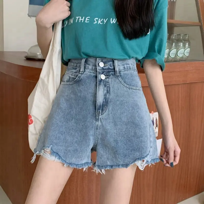 

Summer new denim shorts women's loose 2021 Korean high waist holes show thin A-line thin hairline hot pants fashion