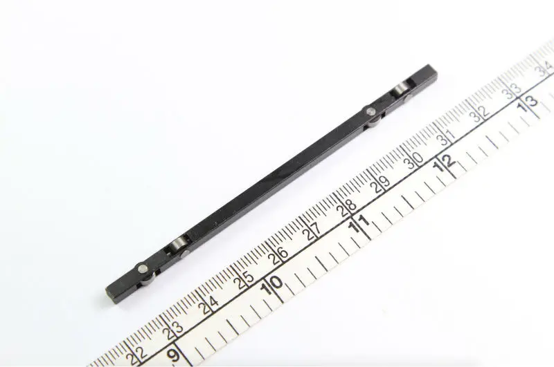 

TAJIMA EMBROIDERY MACHINE PARTS SLIDE ROLLER FOR 9 COLOR HEAD EF055300####