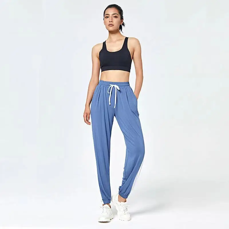 

Spring and summer thin quick-drying sports pants ladies casual solid color loose feet running fitness nine points yoga pants