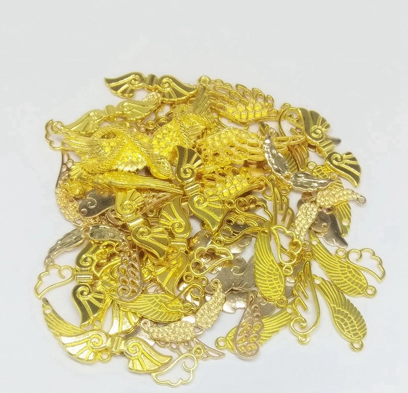 100 граммов в упаковке смешанпосылка из сплава виде крыльев и перьев для легких