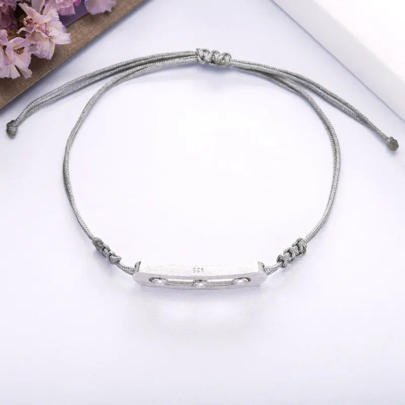 

Moonmory 100% 925 Sterling Silver Move Stone Bracelet For Unisexe Grey Rope Adjustable Bracelet CZ High Quality European Jewelry