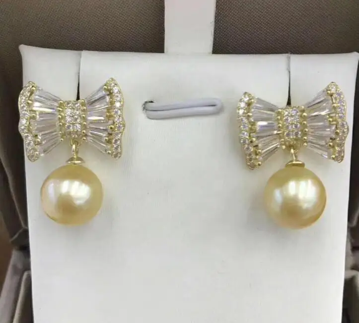 

Wholesale price New Exquisite beautiful 100% Natural freshwater pearl Bow tie earring 925 silver