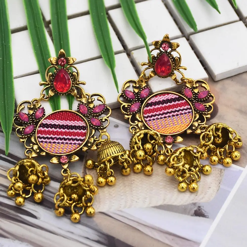 

New Bohemian Color Rhinestone Earrings National Style Retro Gold Earrings Female Alloy Bell Pendant Earrings.