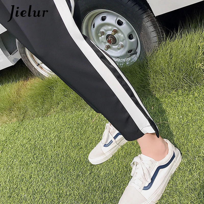 

Jielur 2020 New Autumn Harajuku Casual Trousers Side-stripe Pants Female M-XXL Loose Elastic Waist Pockets Women's Pants Black