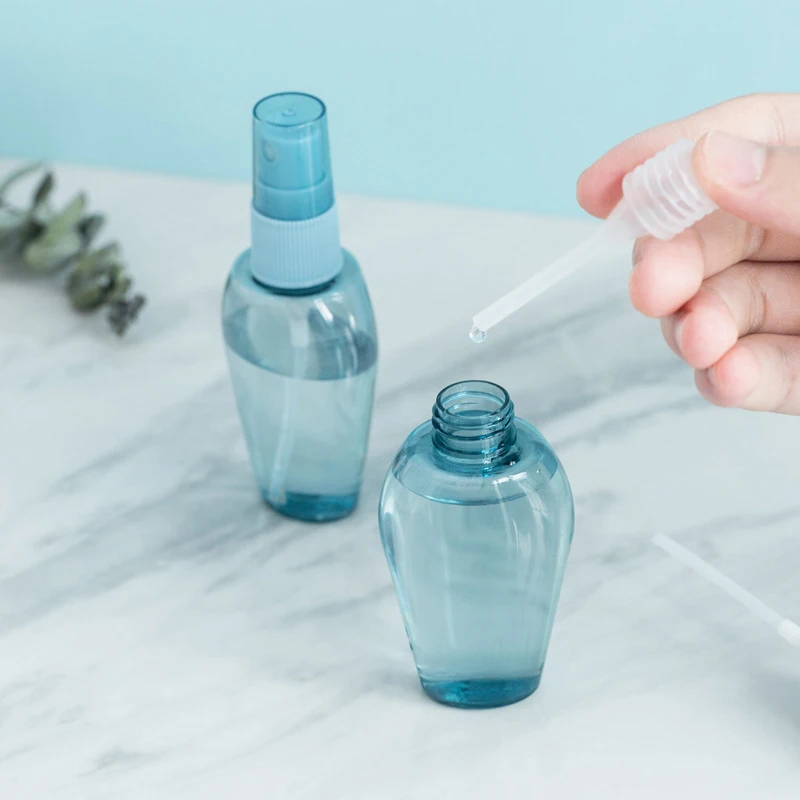 Buy 9pcs/set Travel Sub-bottle Refillable Bottles Mini Spray Bottle Portable Lotion Jars Blister Cosmetic Sample Containers on