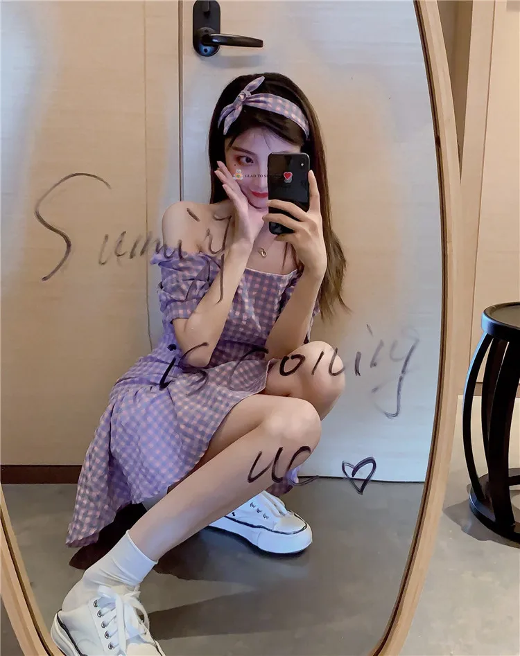 

Make firm offers French institute wind girl hubble-bubble sleeve waist dress purple grid