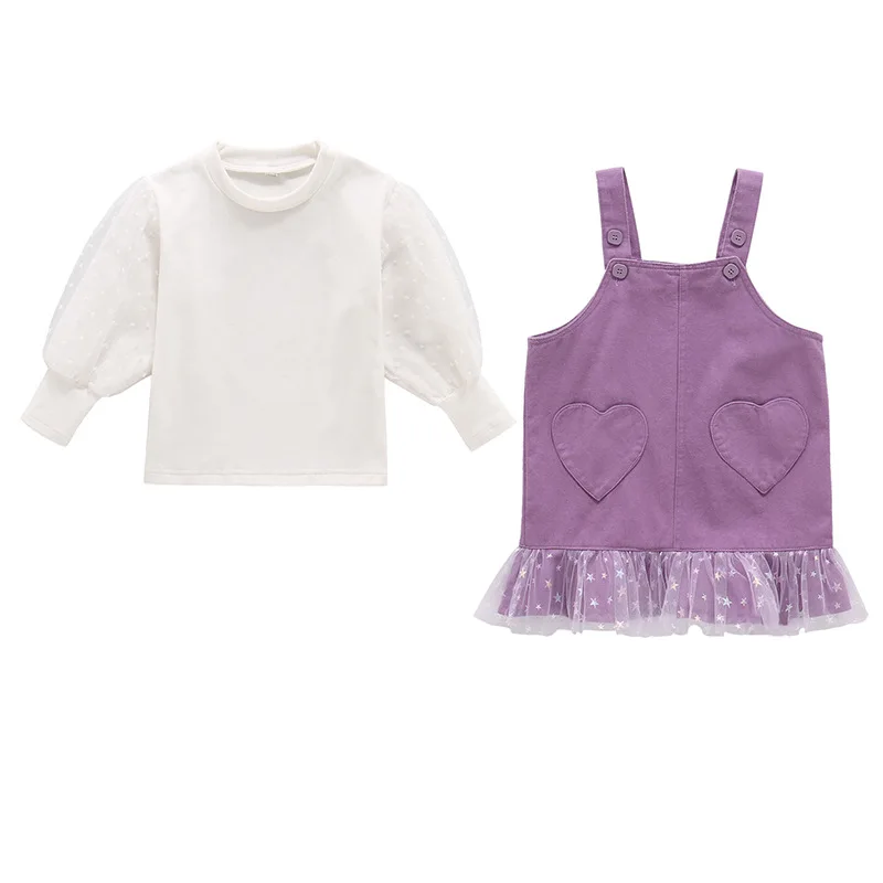 

Girls' Solid Color Suspender Skirt Suit 2020 Autumn New Puff Sleeve T-shirt + Suspender Skirt Two-piece Children's Wear