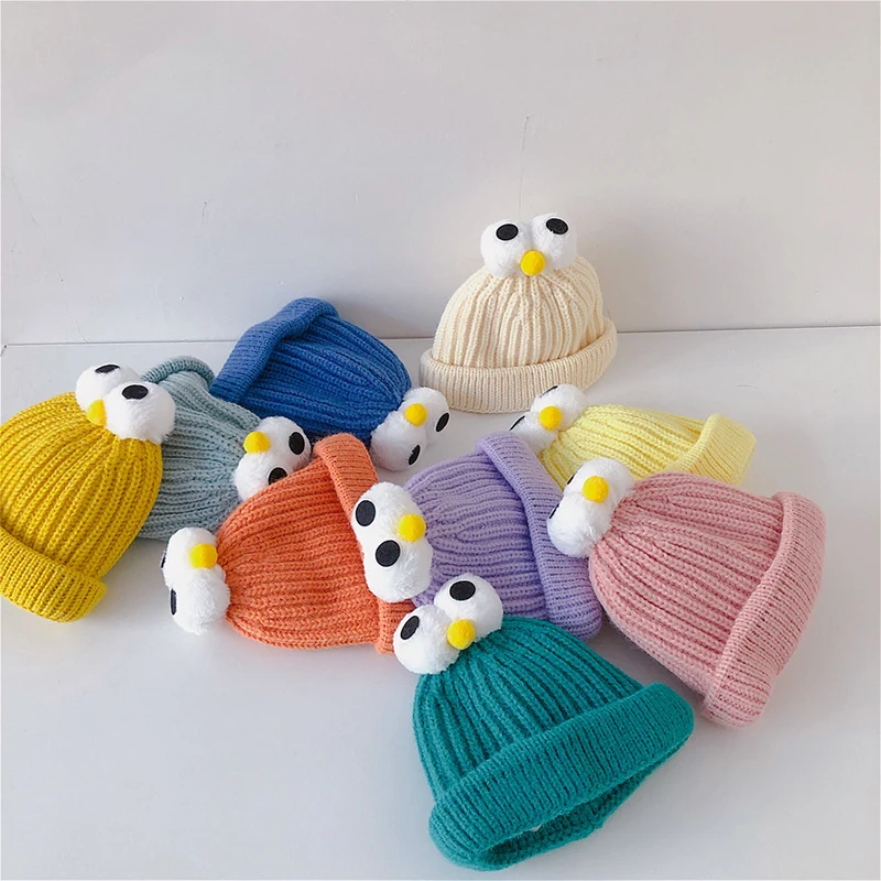 

Шапка-бини вязаная с мультяшными глазами, на осень/зиму