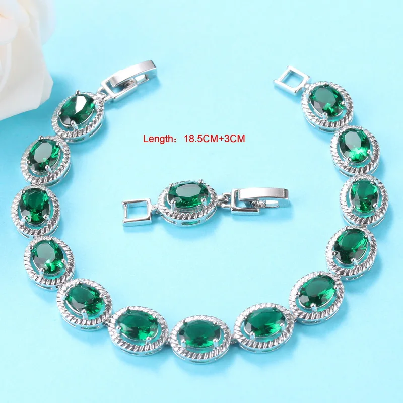 Женский ювелирный комплект Свадебный костюм из серебра 925 пробы с зеленым