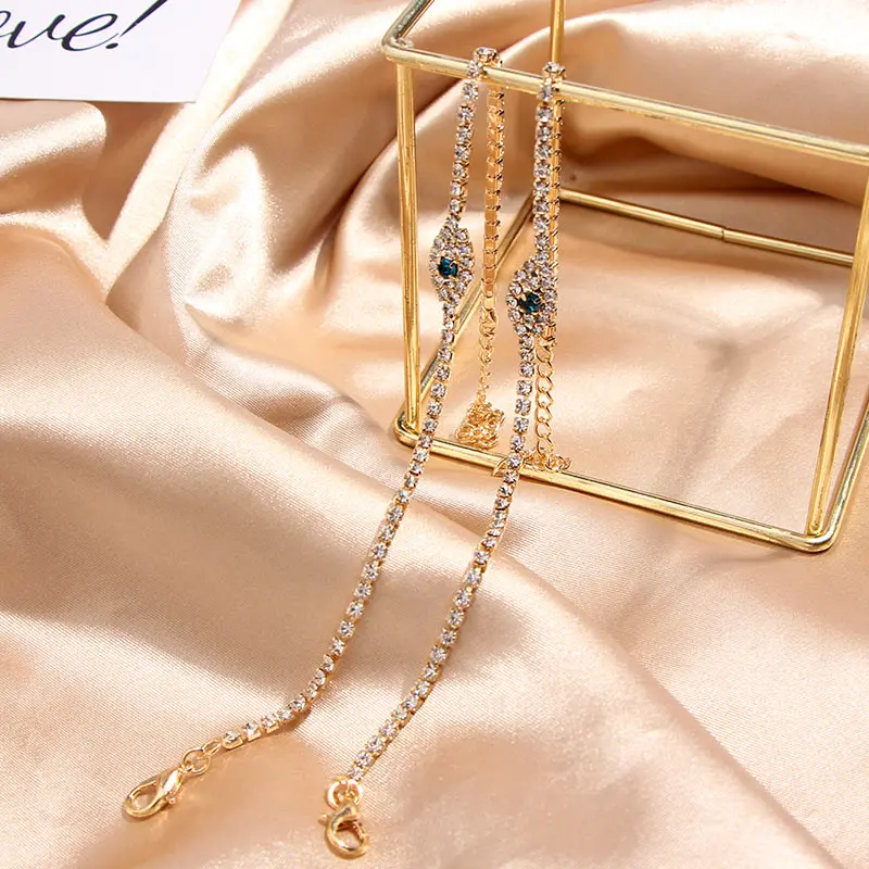 Браслеты на ногу женские золотистые анклет с кристаллами и звеньями сглаза