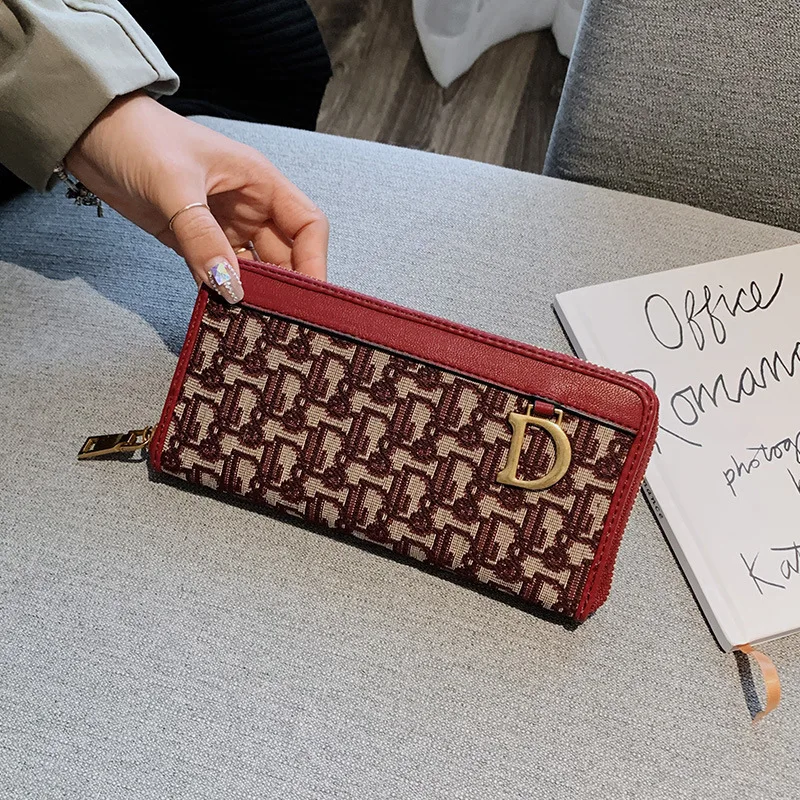 

2021 Europe and America D Tide Brand Women's Long Purse Weaving Letter Dijia Zipper Hand Bag