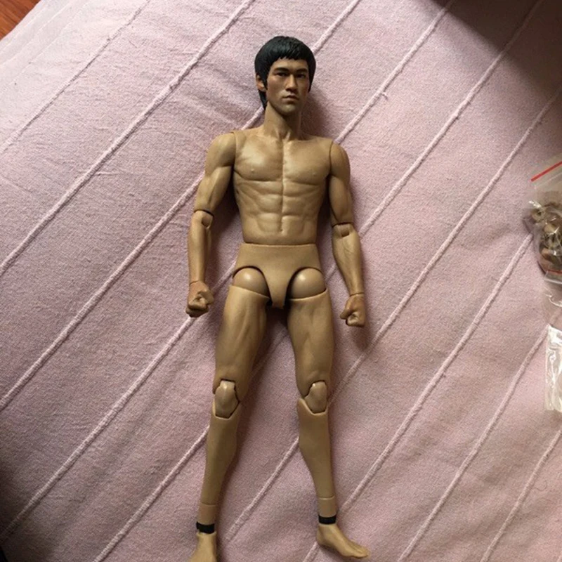 

In stock 1/6 scale G002 Asian Male Body Muscle Action Figure Model of Bruce Lee Similar to HT DX04 type with Extra Hands