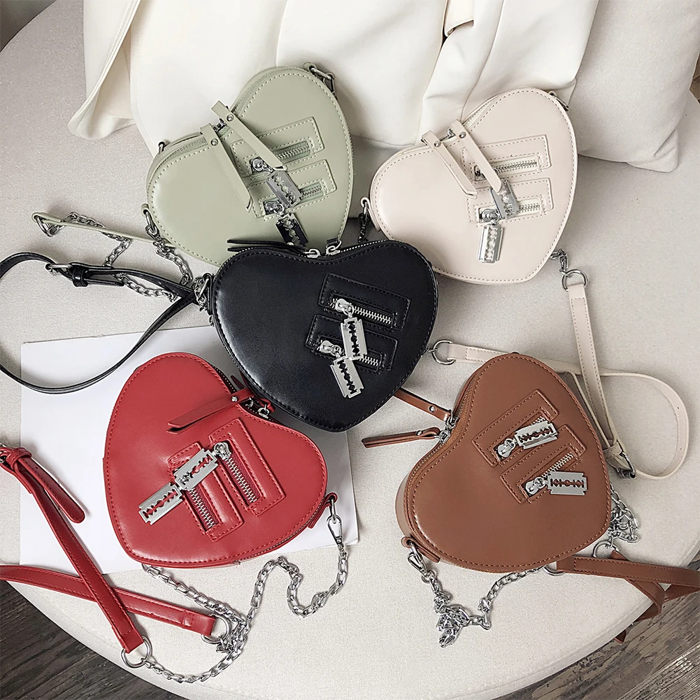 

Повседневные сумки через плечо в форме сердца с цепочкой, модная женская сумка из искусственной кожи на молнии, портативный однотонный коше...