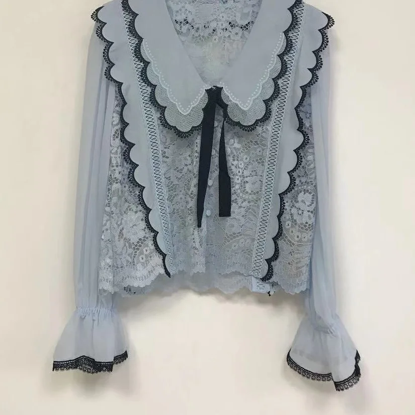

and 2021 Spring Autumn New Sweet Hollow Lace Shirt Fashion V-neck Bowknot Ruffled Flare Sleeve All-match Shirt Women
