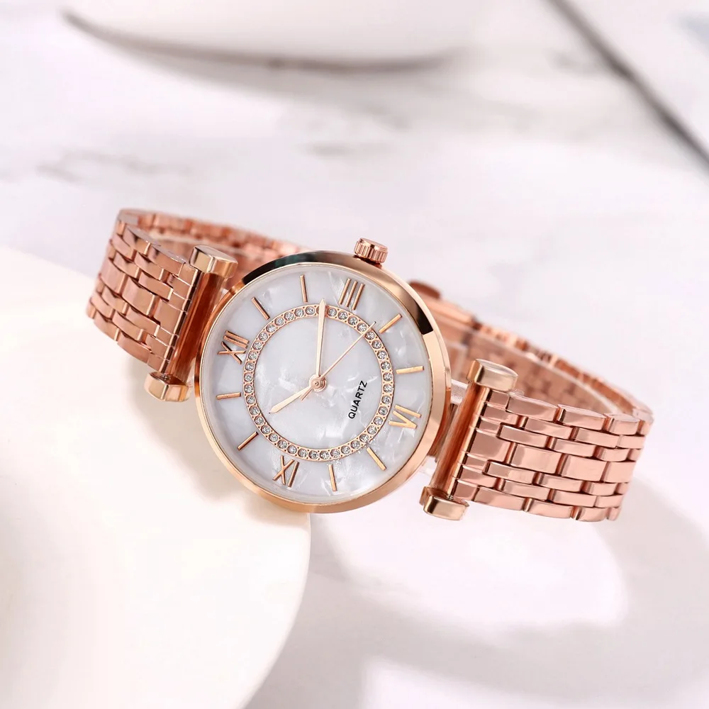 Женские часы из розового золота с кристаллами и сетчатым ремешком нержавеющей