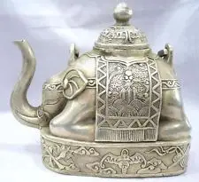 

CRAFTS ARTS NICE CHINESE OLD COLLECTOR CHINESE TIBET SILVER ELEPHANT SHAPE FIGURE TEAPOT GARDEN DECORATION BRASS BRASS