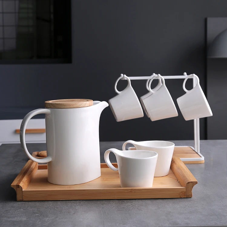 

Nordic Creative Coffee Cup Ceramic Vintage Tea Cup Wood Tray White Tea Cups and Saucer Sets Taza Ceramica Porcelain Cup