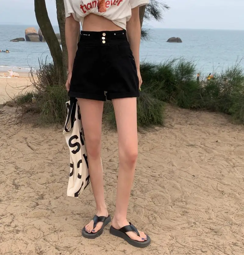 

2122 Summer Korean version of 2021 new high-waisted slim design niche curled black shorts