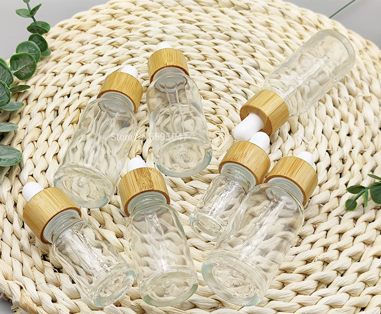 

5ml 10ml 15ml 30ml 50ml Empty Glass Essential Oils Bottle With Bamboo Lid Clear Dropper Bottle Containers With Pipette