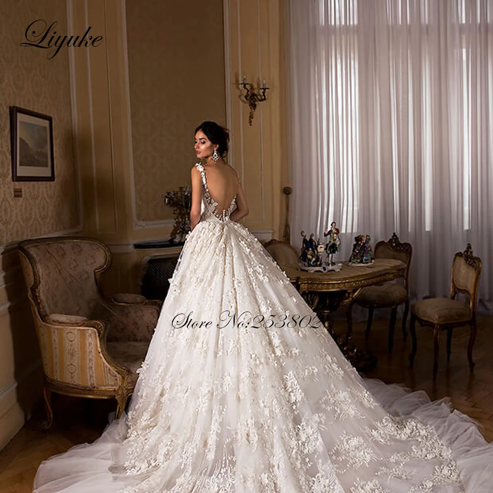 

Liyuke Spaghetti Strap A-Line Wedding Dress With Sweetheart Neckline Of Sleeveless Chapel Train Wedding Gown