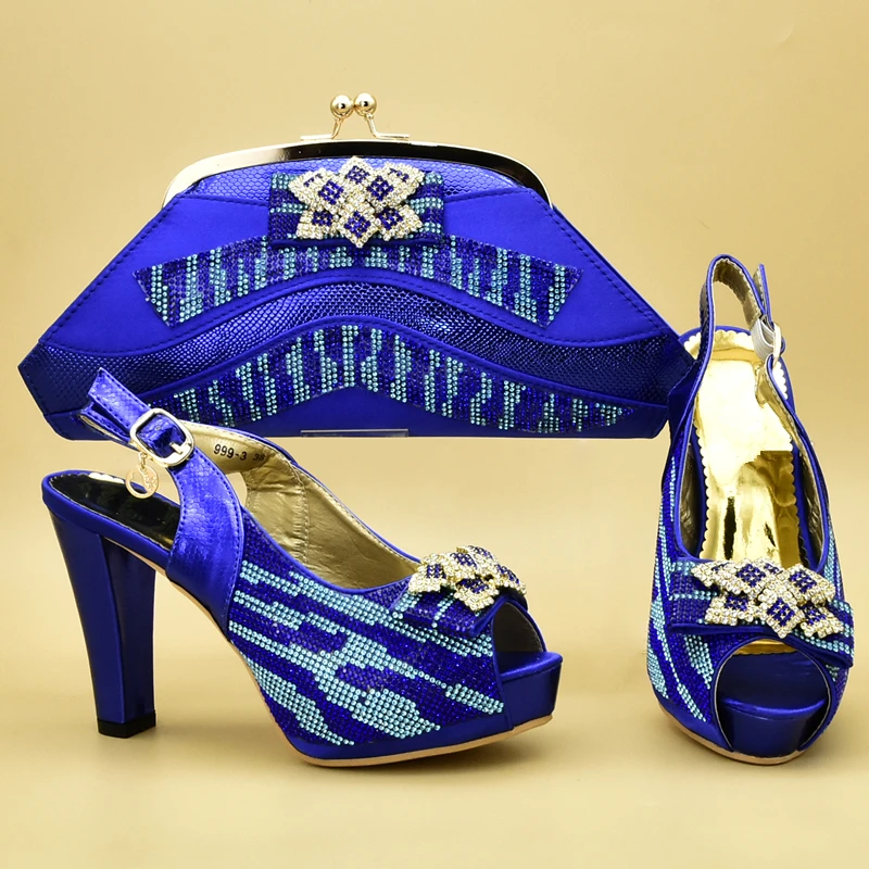 Комплект из итальянских туфель и сумочки украшенные аппликацией в африканском