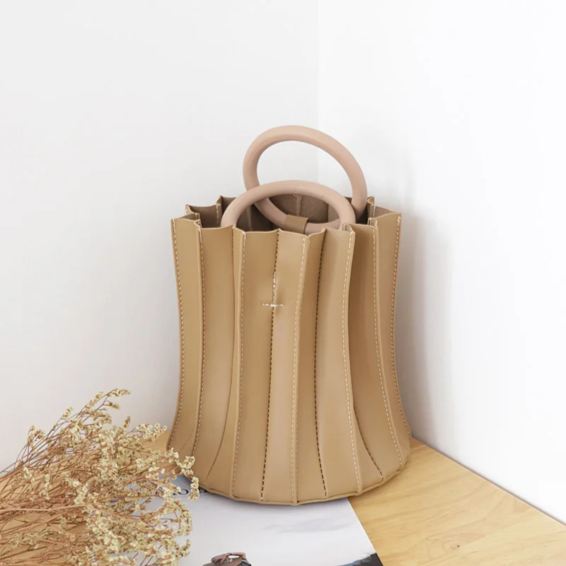 Маленькая дизайнерская сумка мешок простая трехмерная складная модная на одно