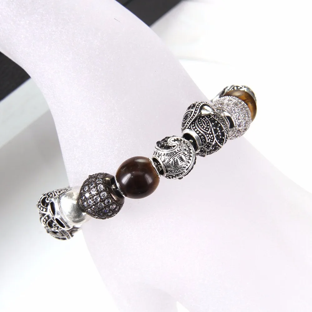 Браслет из бусин Thomas Style KM с орлом тигровым глазом совой черепом маори бусинами