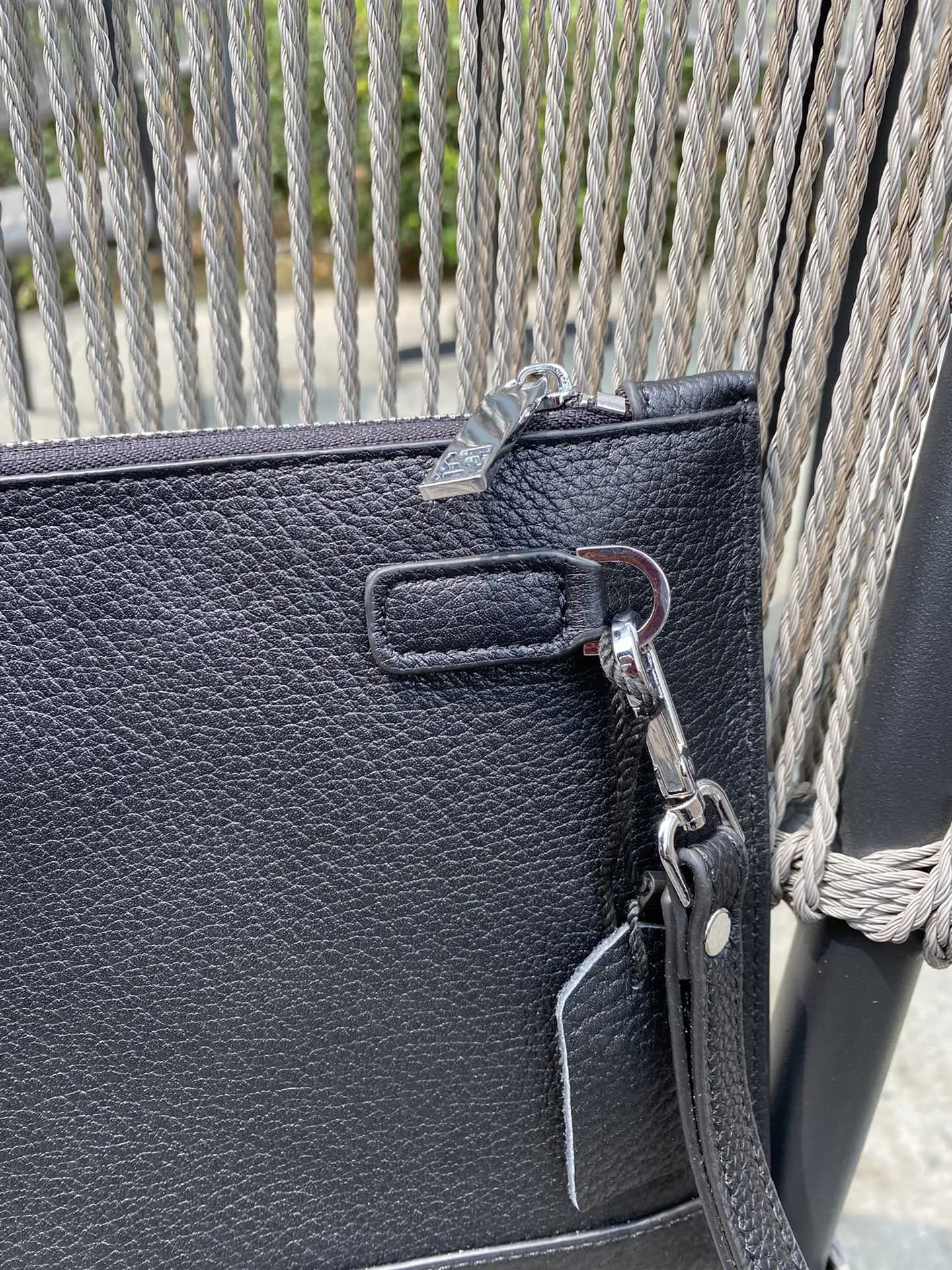 

New leather men and women large-capacity fashion handbag messenger bag clutch