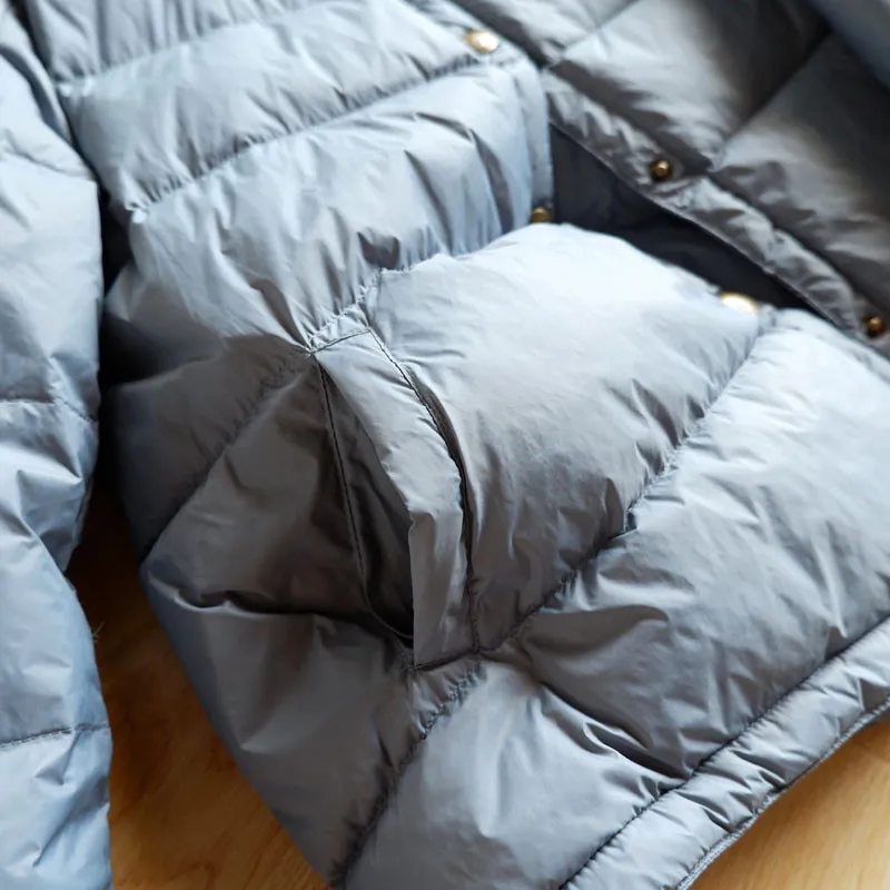 Женский короткий пуховик на утином пуху теплый тонкий осень и зиму светильник