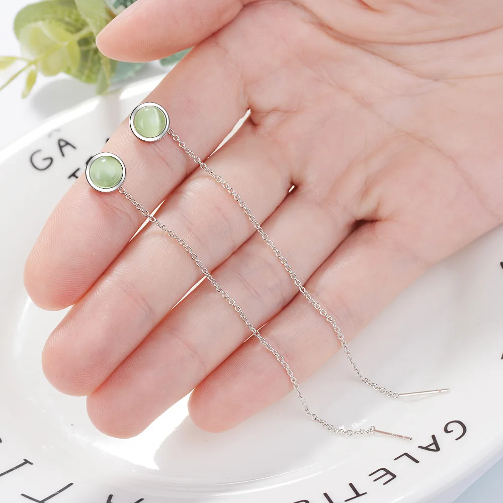 Женские круглые серьги подвески с зеленым камнем в форме кошачьего глаза