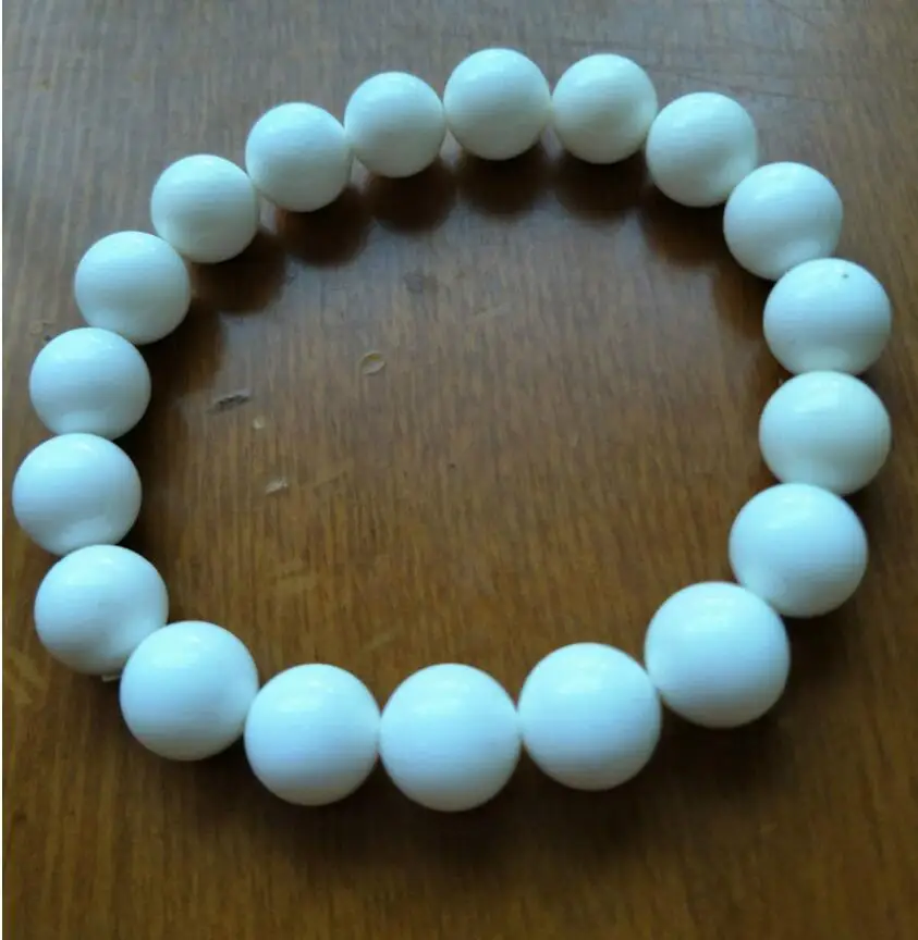 

new hot New Fashion beautiful 10mm pure white Round elastic bracelet 7"