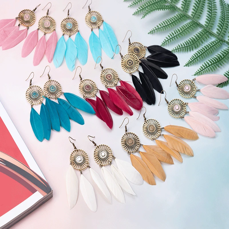 

2021 New Fashion Long Tassel Pendant Feather Red Earrings Female Ethnic Style Long Hollow Bohemian Earrings Wholesale Jewelry
