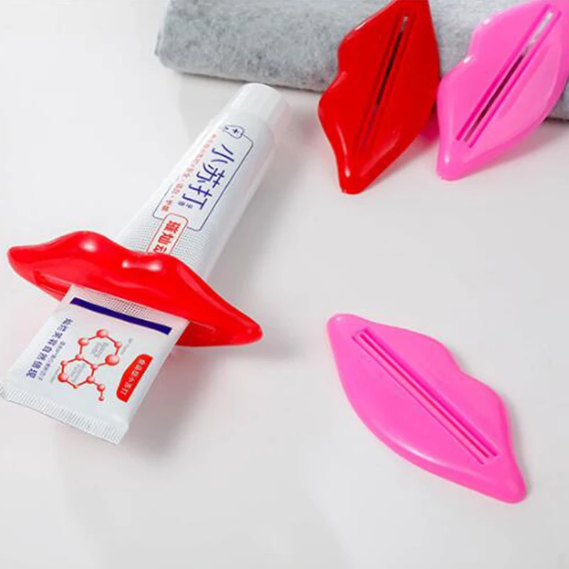 

Hot Sale Easy Toothpaste Dispenser Lip Shape Plastic Tooth Paste Tube Squeezer Useful Toothpaste Rolling Holder For Home