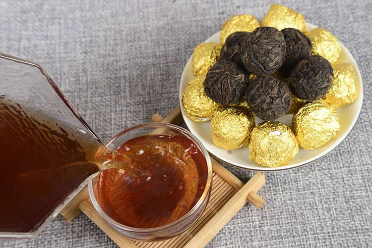 

Yunnan Pu'er Tea Cooked Tea Dragon Ball Ban Zhang Golden Bud Handmade Court Tuo Tea