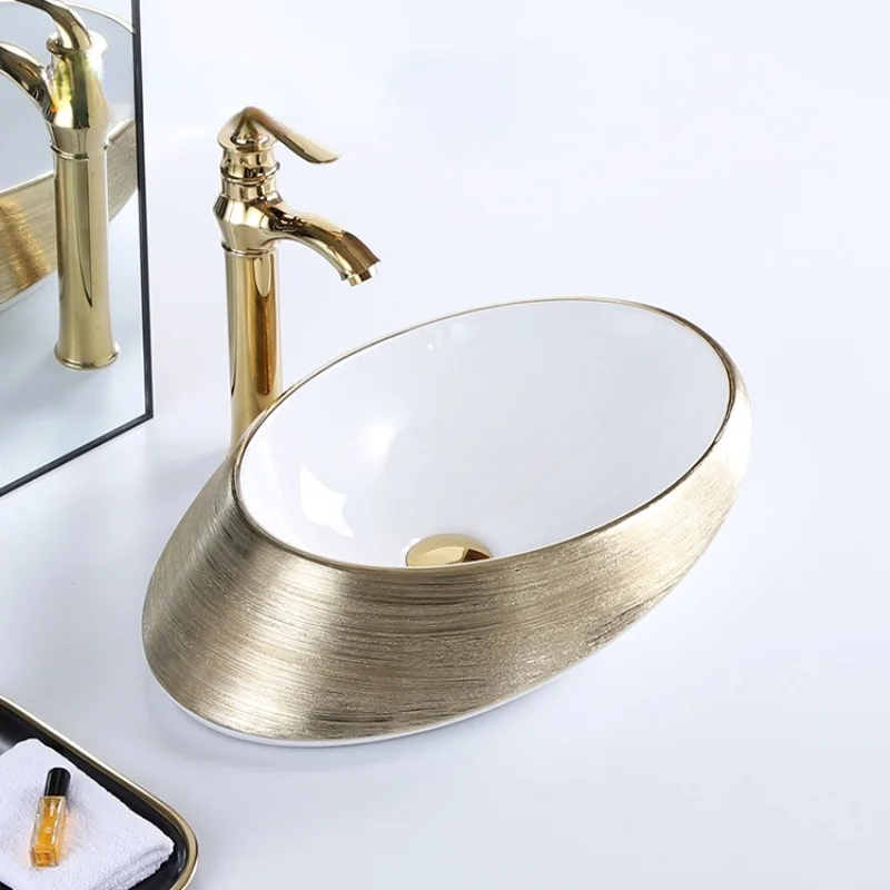 

Hotel decor fancy luxury oval plated gold and white ceramic table top bathroom vessel sink art hand wash basin Bathroom sink