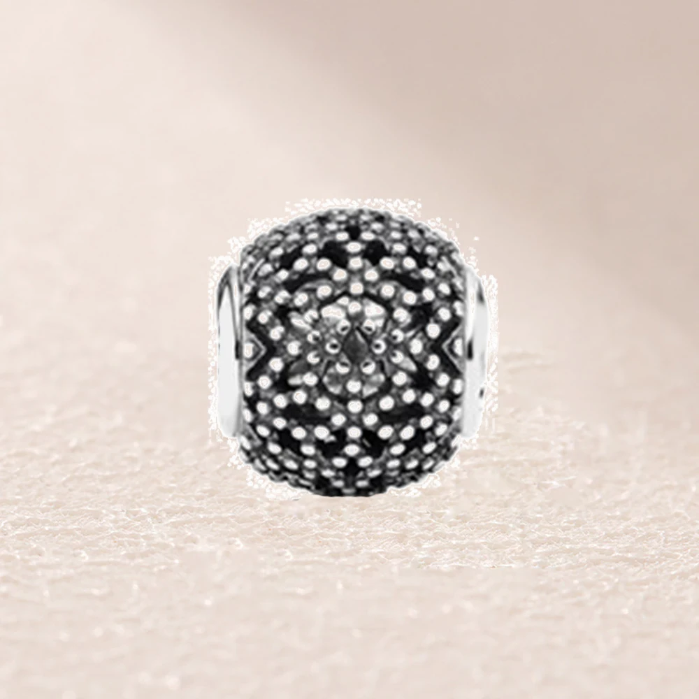 

796013 WELLNESS COLLECTION openwork charm in silver