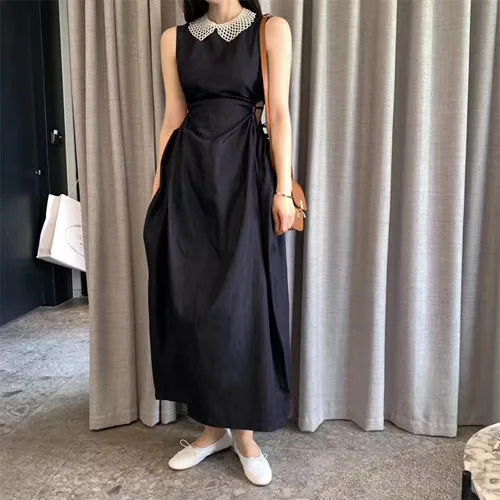 

VICONE The new show thin sleeveless pearl collar draw string temperament dress