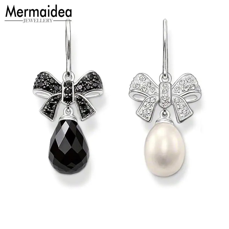 Женские сережки-капельки с бантом и серебряным покрытием ювелирное изделие