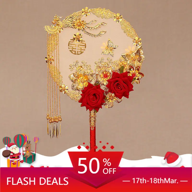 

Chinese bride covers her face and holds flowers in her hand. Ancient style wedding, wedding, group fan, wedding luxury hand fan