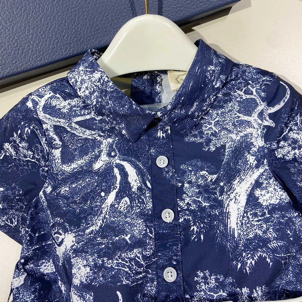 

Brand design girl 2021 summer new ink a hem slim single breasted Lapel short sleeve pleated jungle printed Girl Dress