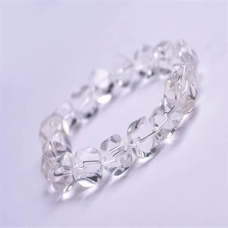 Браслет ручной работы с кристаллами кварца стрейчевый прозрачный кристалл