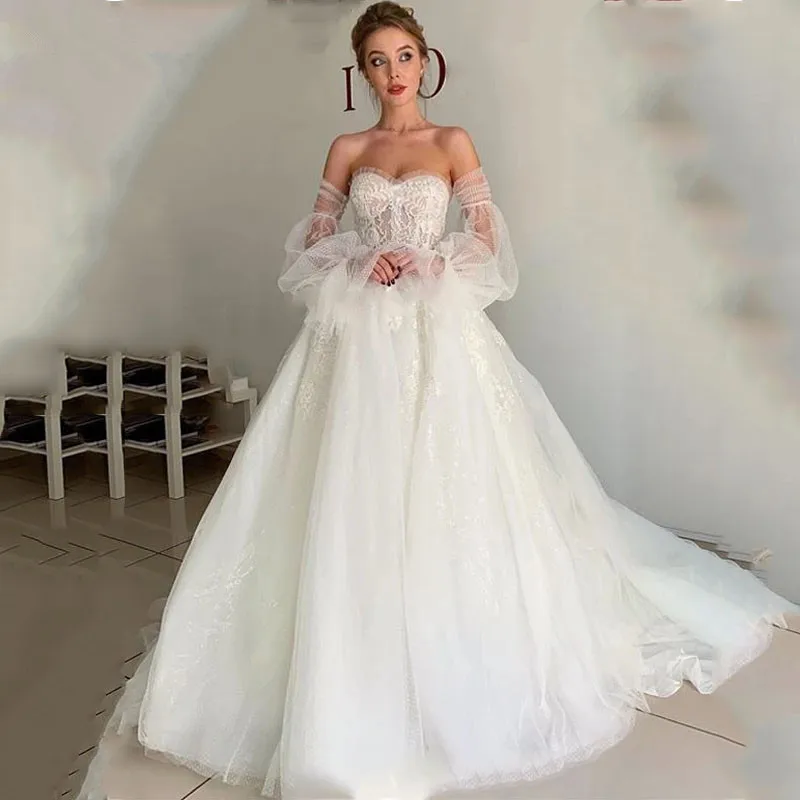 

Boho Wedding Dresses Off Shoulder Puff Sleeves Appliqued Lace Bridal Gowns 2020 Robe De Mariee Elegant Sweethearet Wedding Gowns